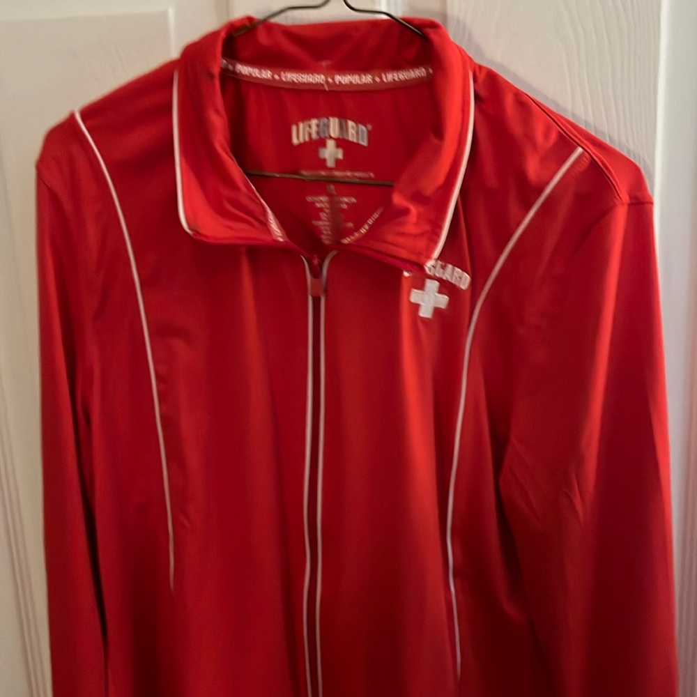 Lifeguard Red warmup jacket, size extra large, good condition.